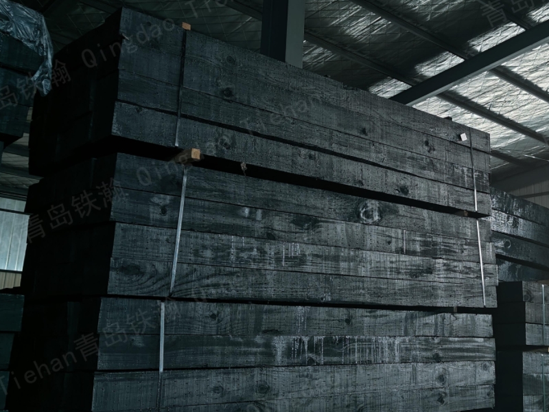 Railway sleepers are not smoked black. They wear black armor when they go to work